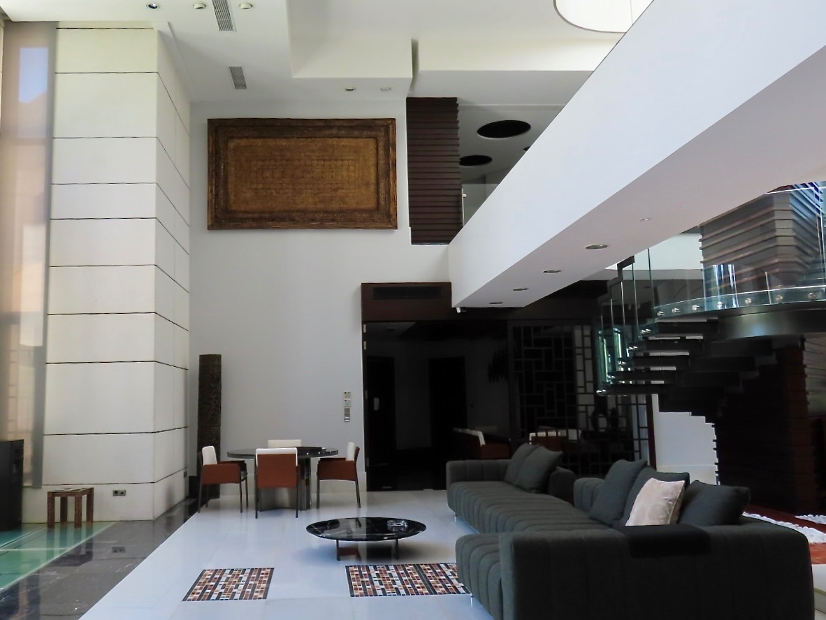Nine-metre atrium beneath an elliptical skylight